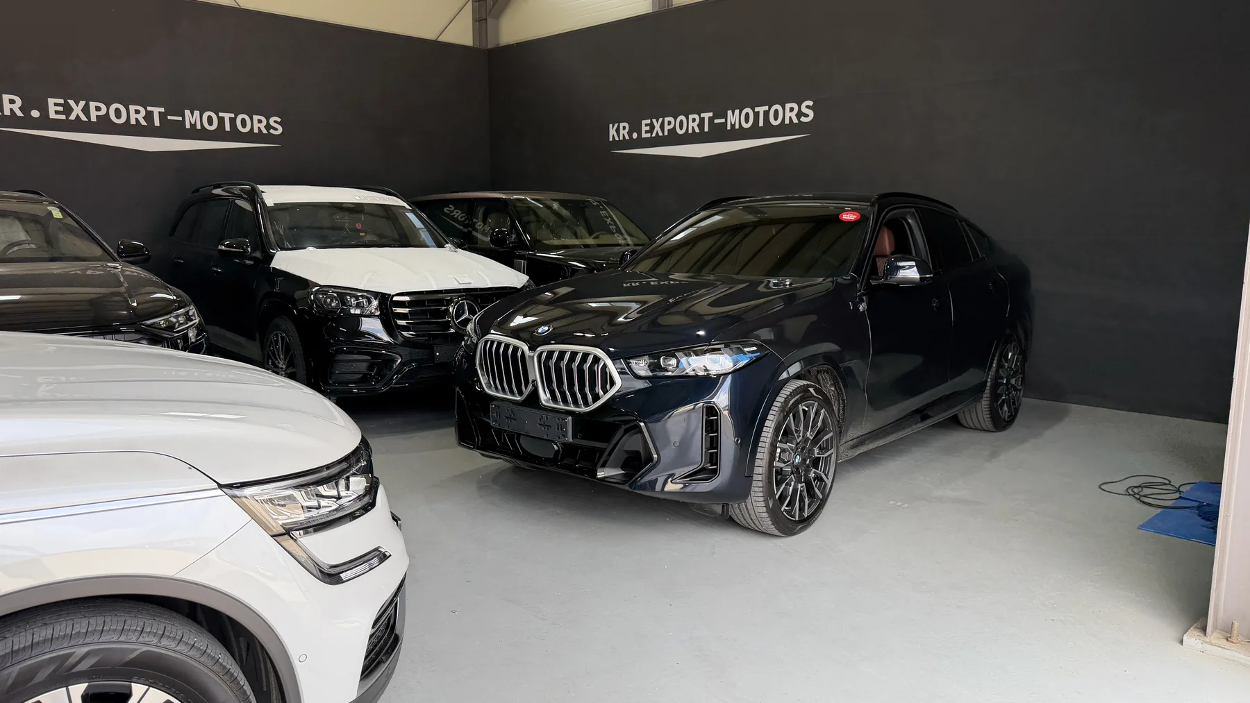 Как привезти авто из Кореи: BMW X6 и Mercedes на складе KR Export Motors